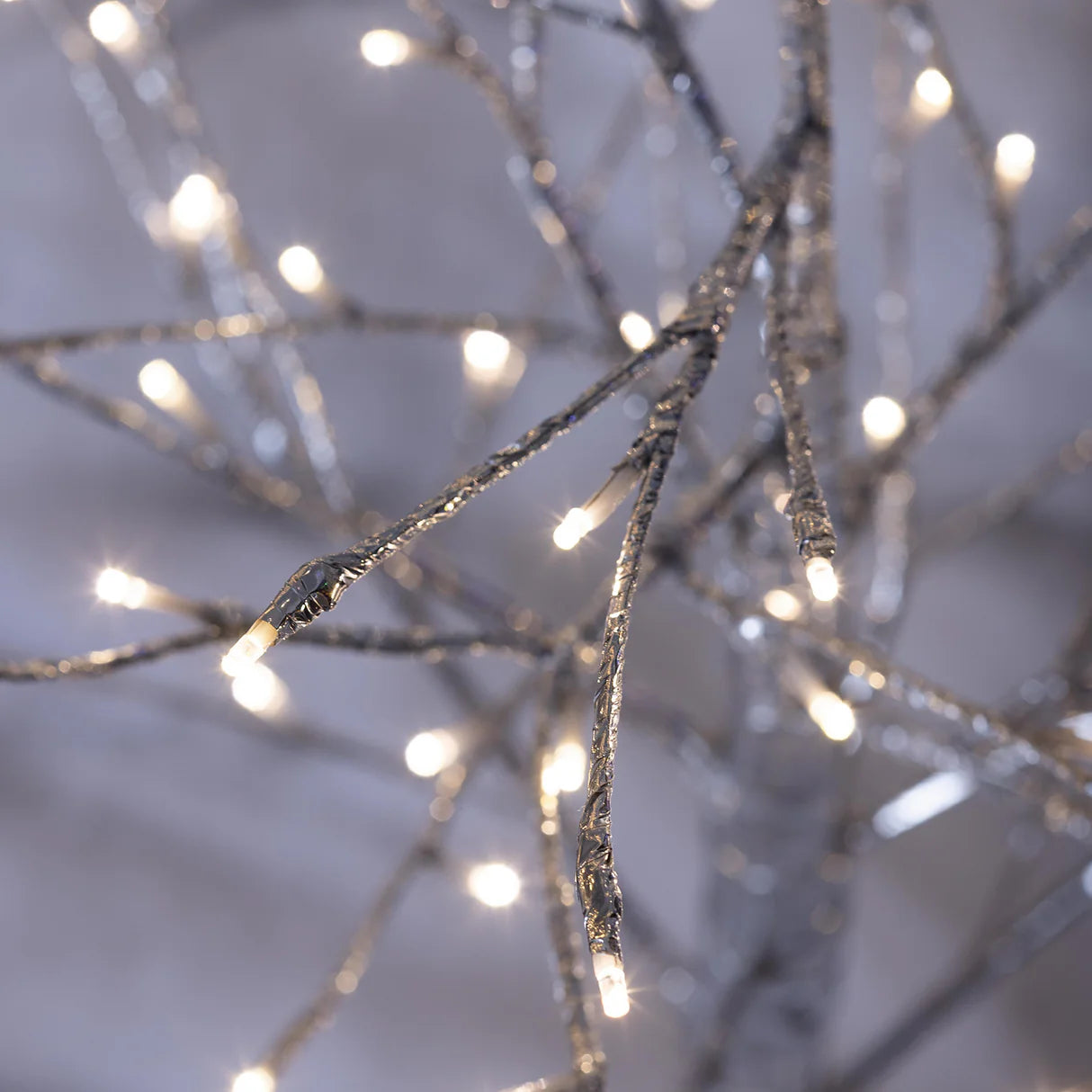 4'H Indoor/Outdoor Silver Metallic Tree with 112 Lights