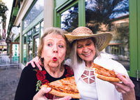 ELDERLY WOMEN WITH PIZZA CARD
