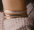 Posy - Love (Hearts) Bangle - Antique Gold Finish by &Livy - A. Dodson's
