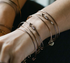 Love Knot Bangle Bracelet - 6 colors, 2 sizes by &Livy - A. Dodson's