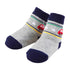 GRAY/NAVY CAR SOCKS BY MUD PIE - A. Dodson's