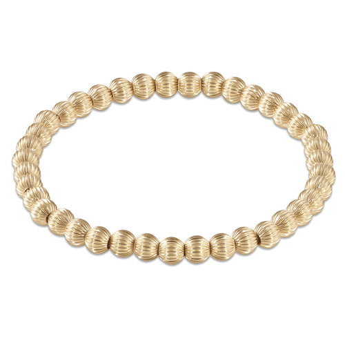 dignity gold 5mm bead bracelet by enewton