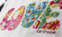FLOWER POWER LOVE LETTERS PILLOW BY CATSTUDIO - A. Dodson's